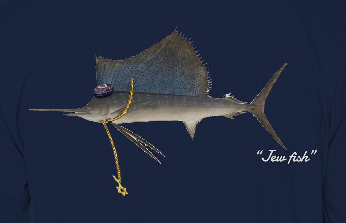 Close-up of the sailfish print on navy fabric: kippah, Star of David chain, Jew fish script