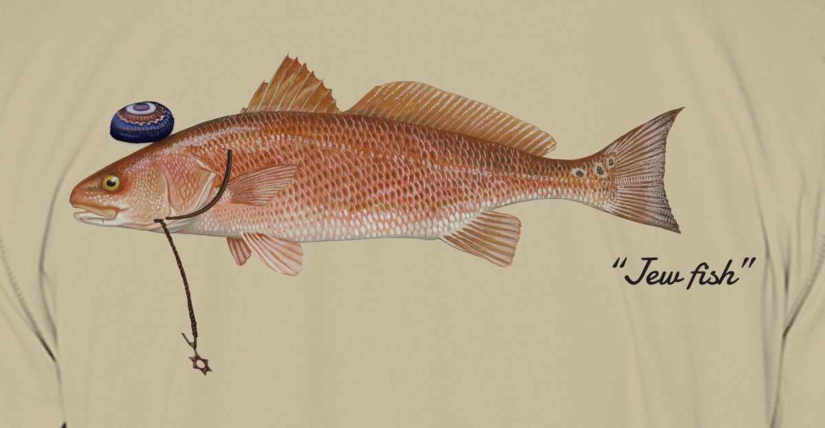 Close-up of the redfish print on sand fabric: kippah, Star of David chain, Jew fish script
