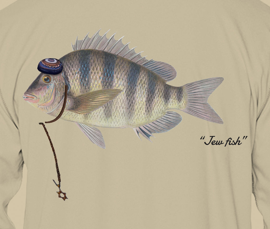 Close-up of the sheepshead print on sand fabric: kippah, Star of David chain, Jew fish script