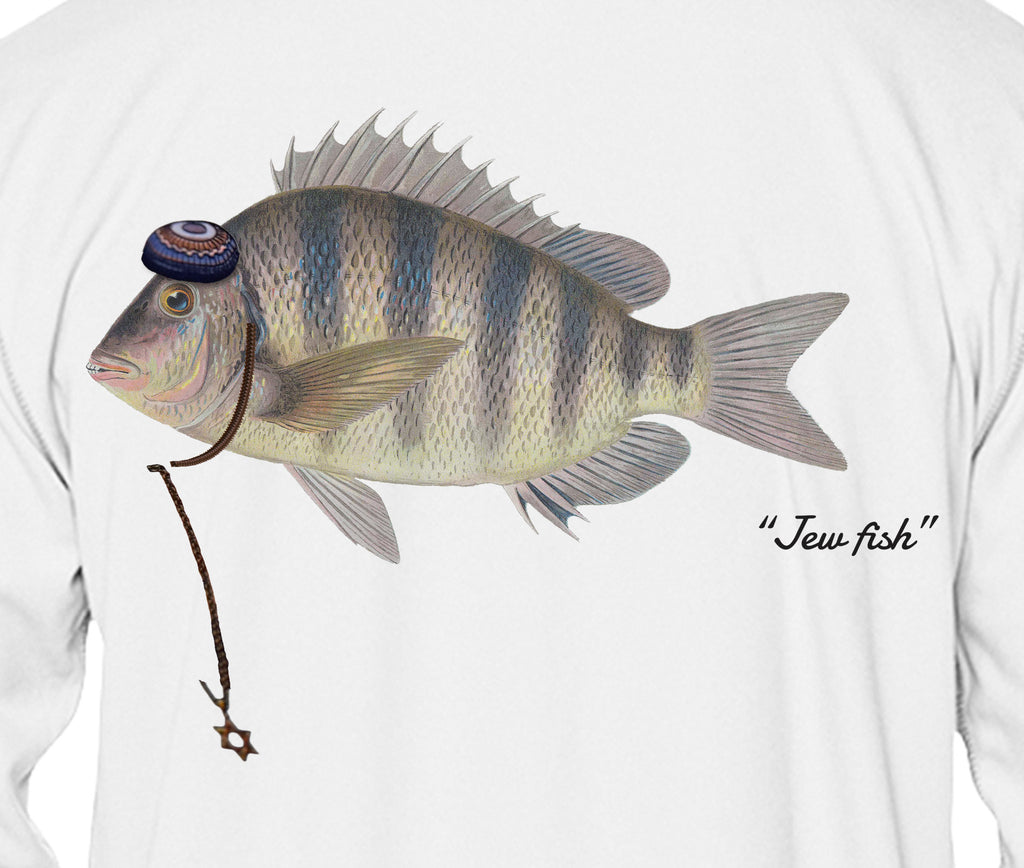 Close-up of the sheepshead print on white fabric: kippah, Star of David chain, Jew fish script