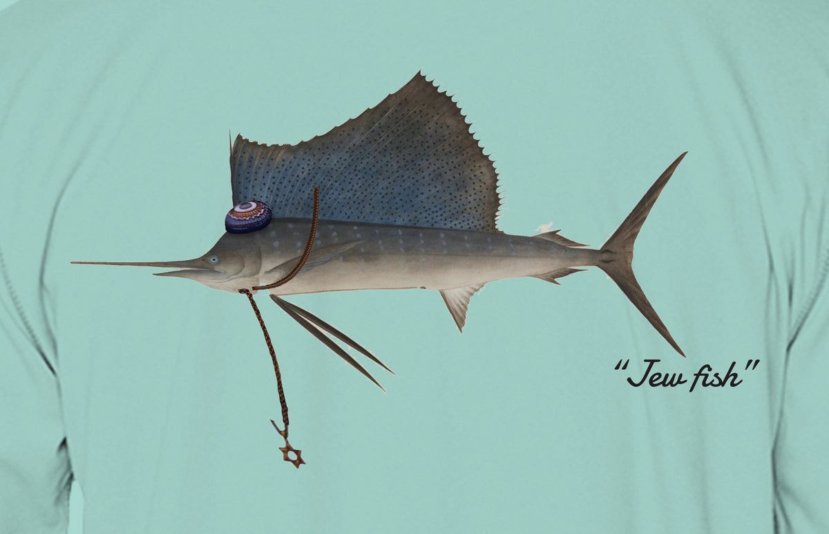 Close-up of the sailfish print on seafoam fabric: kippah, Star of David chain, Jew fish script