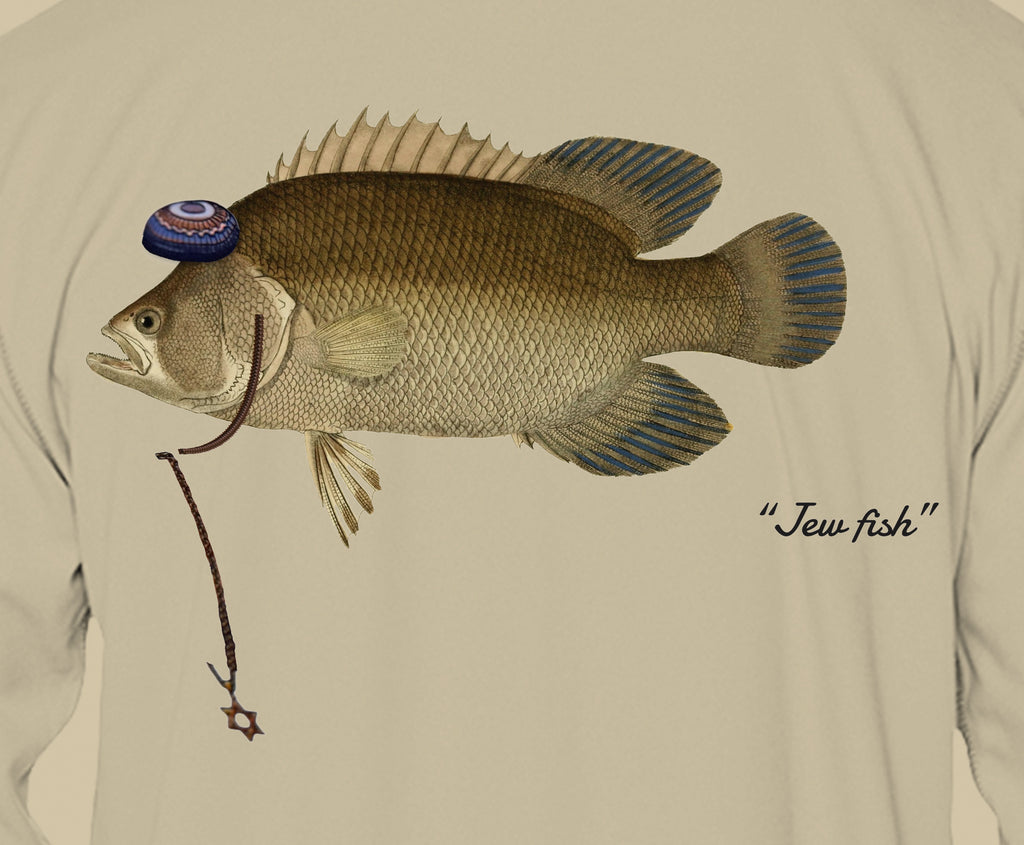 Close-up of the tripletail print on sand fabric: kippah, Star of David chain, Jew fish script