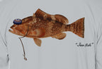 Close-up of the red grouper print on light grey fabric: kippah, Star of David chain, Jew fish script
