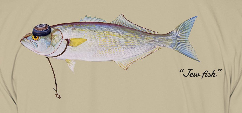 Close-up of the bluefish print on sand fabric: kippah, Star of David chain, Jew fish script