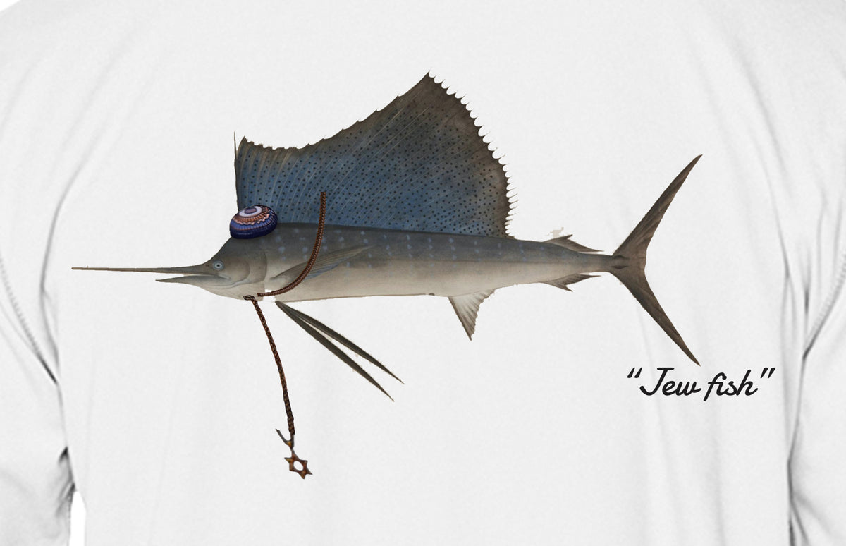 Close-up of the sailfish print on white fabric: kippah, Star of David chain, Jew fish script