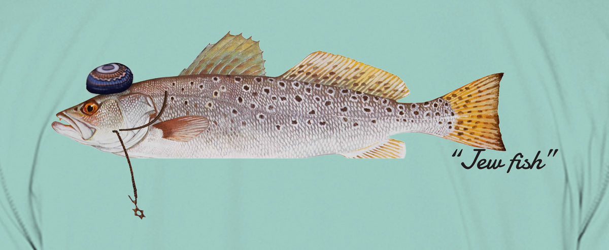 Close-up of the speckled trout print on seafoam fabric: kippah, Star of David chain, Jew fish script