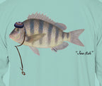 Close-up of the sheepshead print on seafoam fabric: kippah, Star of David chain, Jew fish script