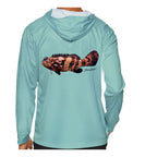 Model wearing the Seafoam "Jew fish" Goliath grouper sun hoodie, back view